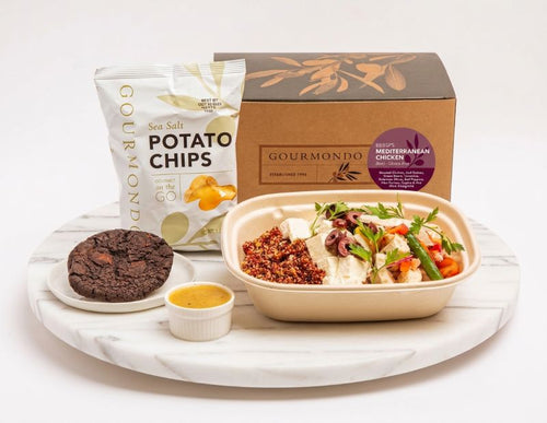 Boxed lunch including bowl, potato chips, and mini chocolate dessert