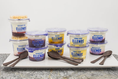Ellenos yogurt individual cups in a variety of flavors, stacked on top of each other