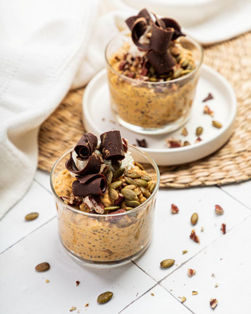 Overnight oats with pumpkin, mascarpone, pumpkin seeds, and chocolate curls