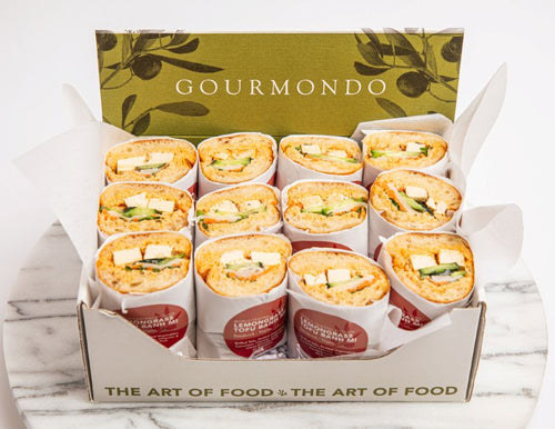 Gourmondo branded box of tofu banh mi sandwich halves