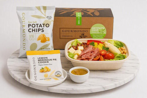 boxed lunch with chop salad, chips, and cookie 