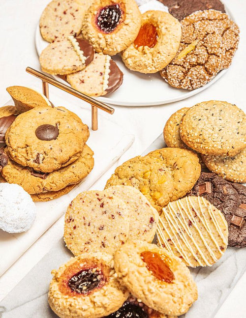 freshly baked cookies including chocolate, thumbprint jammers, molasses