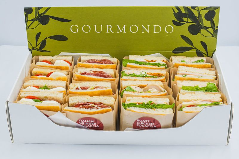 Assorted gourmet sandwich box from Gourmondo with and focaccia sandwiches, packaged for corporate catering, meetings, and events.