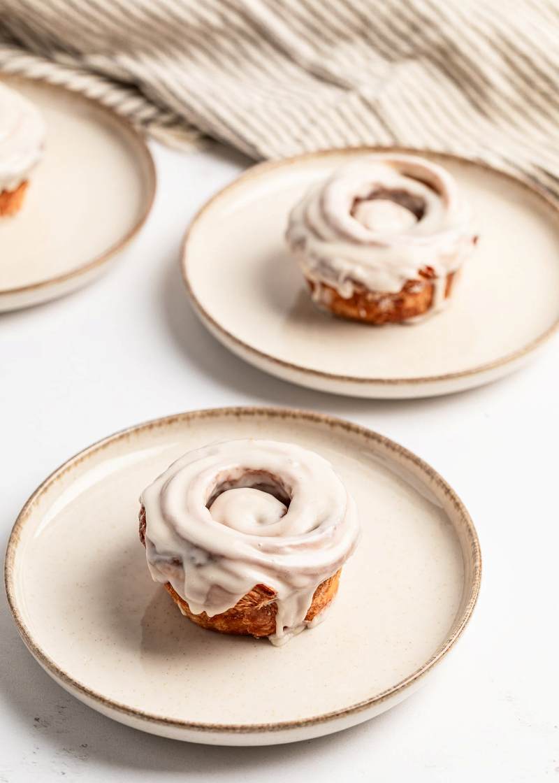 flaky cinnamon roll with vanilla glaze