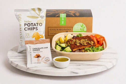 boxed lunch with salmon salad, chips, and cookie 