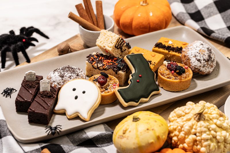 Halloween treats: cookies, pumpkin bars, ghosts, bats, spiders, coffins