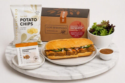 boxed lunch with tofu banh mi, side salad, chips, and cookie 