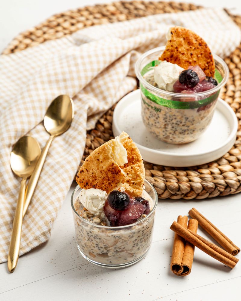 Overnight oats with cooked apples, pears, and cherries, mascarpone, and cinnamon