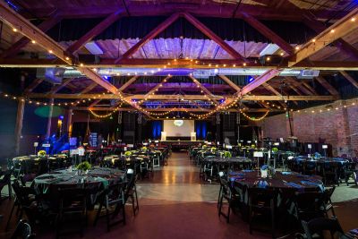 Showbox Sodo venue, set up with round tables and chairs for an event
